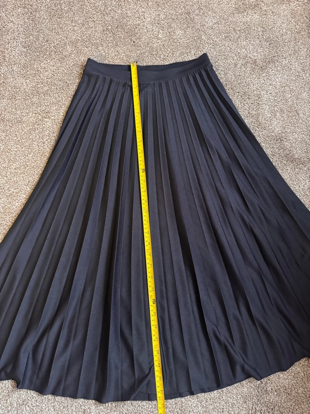 Black pleated midi skirt
